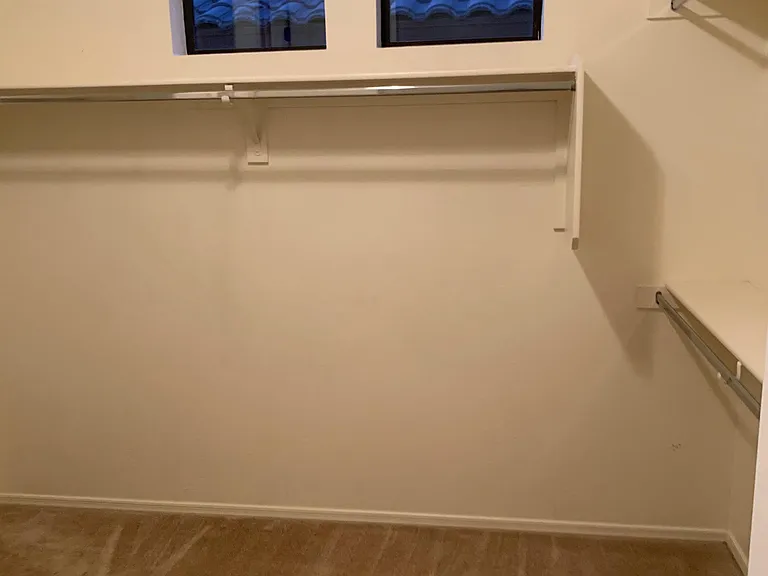 Master closet with natural light