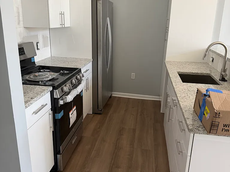 Brand new hardwood floors throughout and freshly painted throughout.