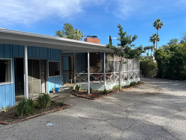 Covered patio, back driveway