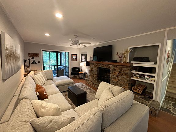 New sectional couch, surround speakers, wood fireplace