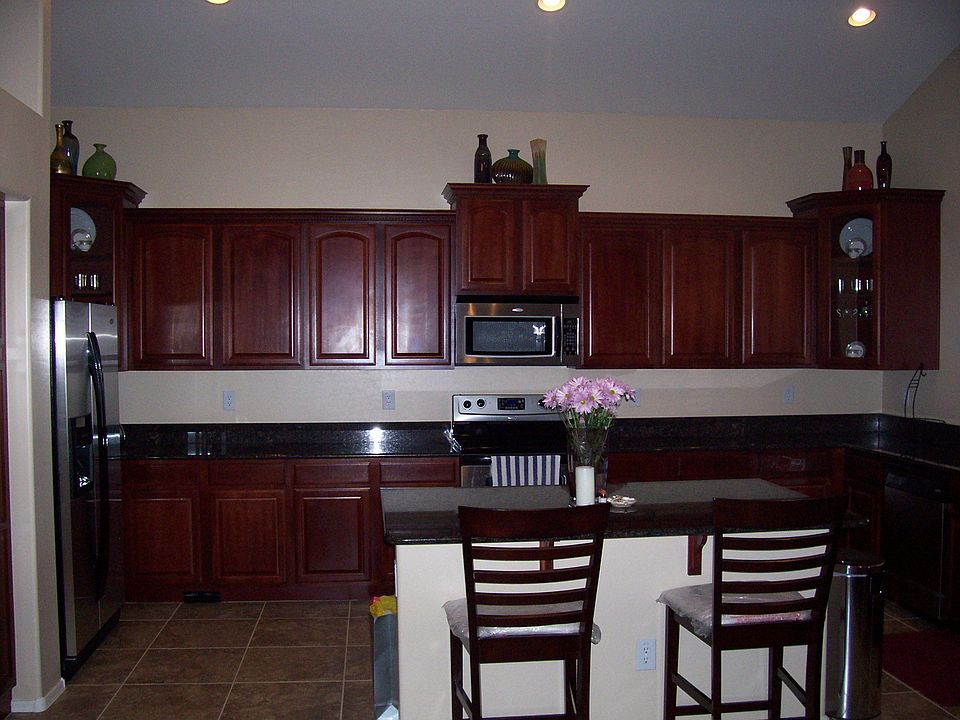Granite, cherry cabinets
