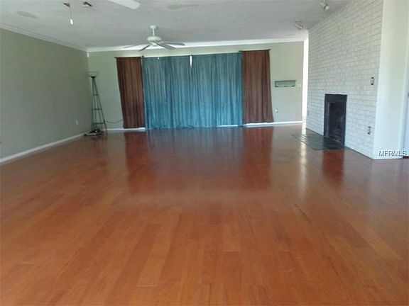 Very spacious great room with gleaming wood floors.