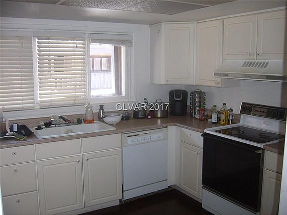 Kitchen, Large Windows Facing the Front of Town Home.