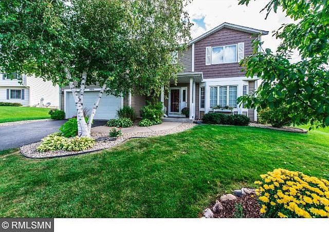 Front Porch and nice tree coverage.