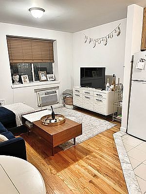 3rd image of 422 E 10th St APT 2F