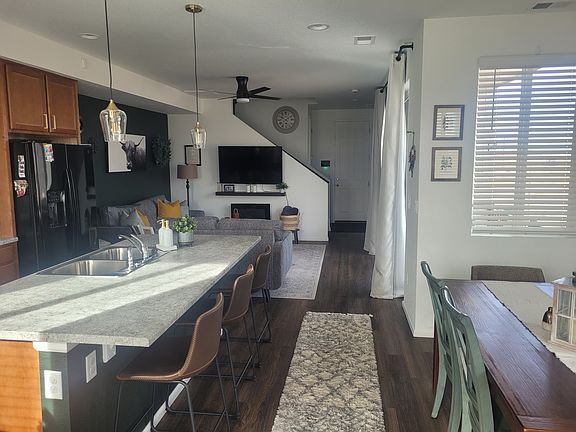 Open kitchen, dining room and living room. View as you walk in the front door