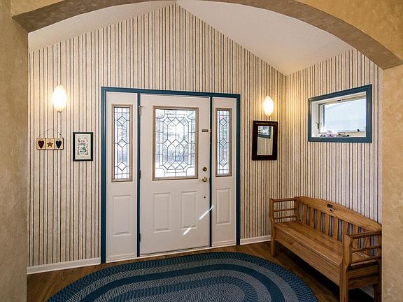 Generous entry is roomy enough for many guests and all the coats and boots a Minnesota winter requires!