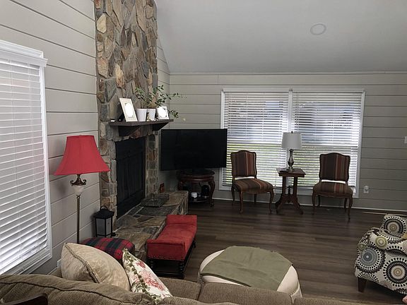 Living room view to front and fireplace
