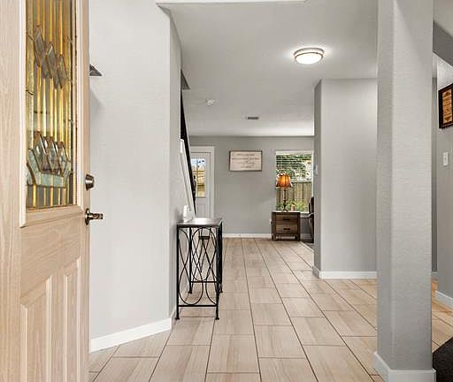 Gorgeous 2 story foyer greets you as you enter this sun filled home