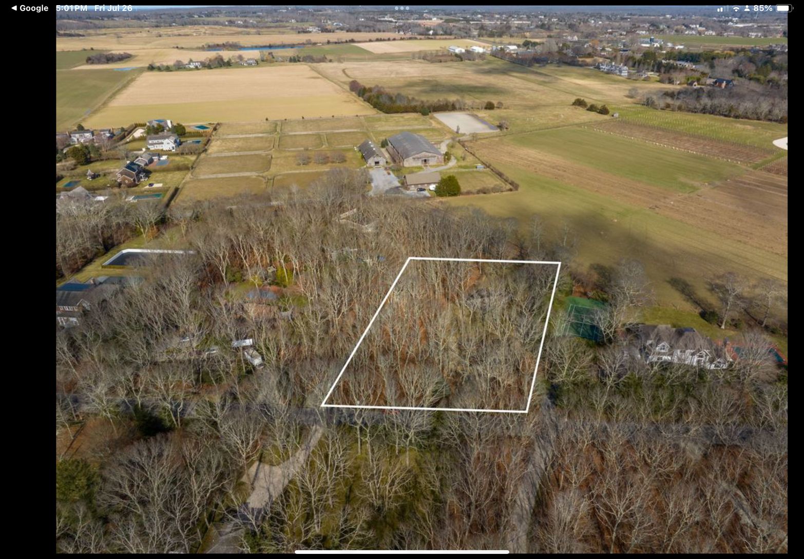 ARIEL VIEW OF PROPERTY WITH PRESERVE BEHIND