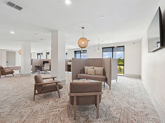 Coworking Lounge with Computers and Printers