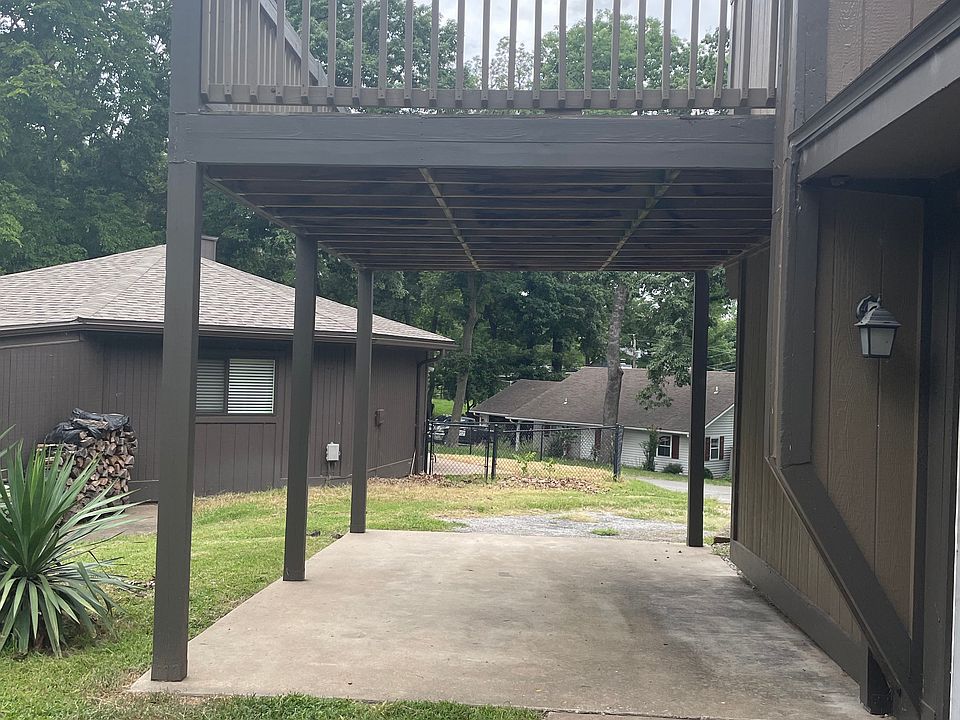 Covered parking and balcony. Extra area for grill, etc.