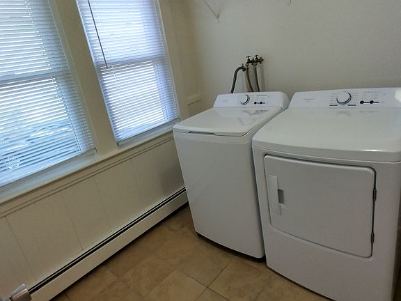 Entry with mudroom and new washer dryer set