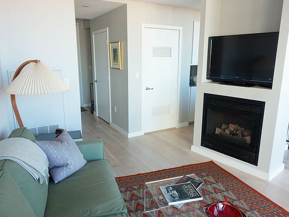 Living room features a gas fireplace
