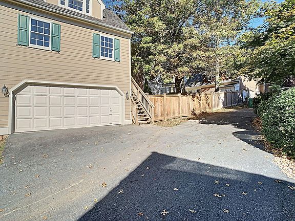 Apt is above the garage with a private staircase up to the front door.