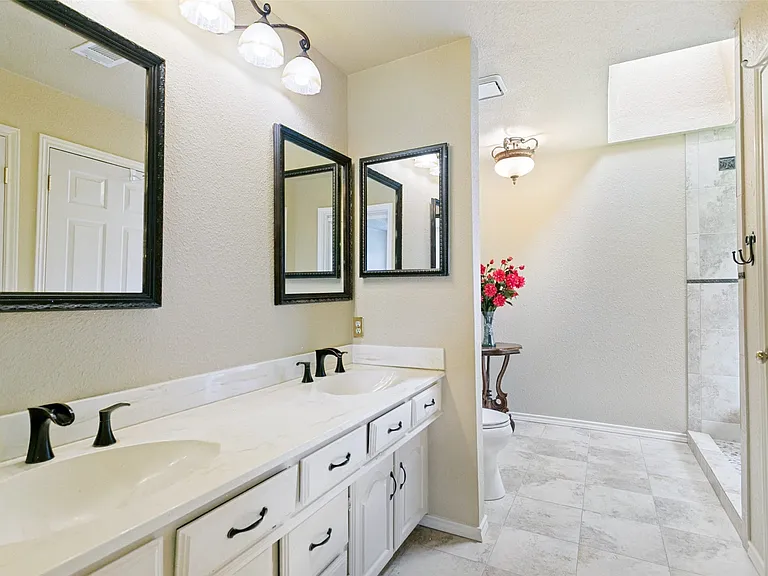Beautifully updated primary master bathroom with oversized shower