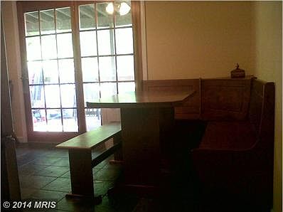 French doors lead to large covered deck