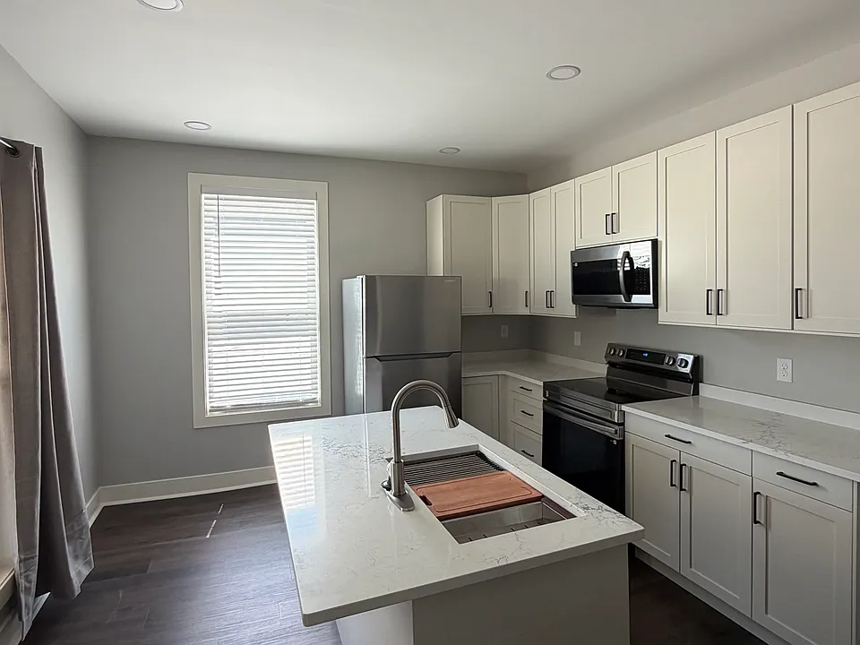 Quartz Countertops and New Stainless Steel Appliances