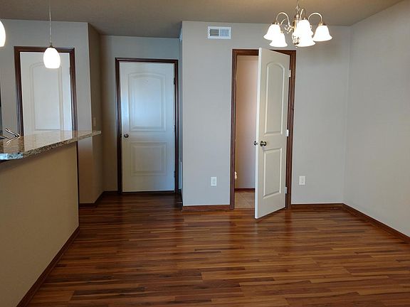Laminate flooring. Half bath. Garage access. Kitchen pantry.