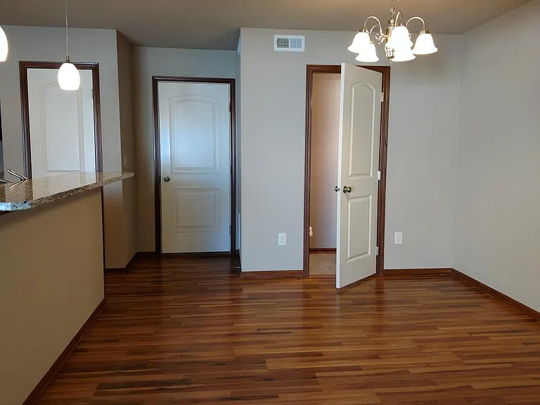Laminate flooring. Half bath. Garage access. Kitchen pantry.