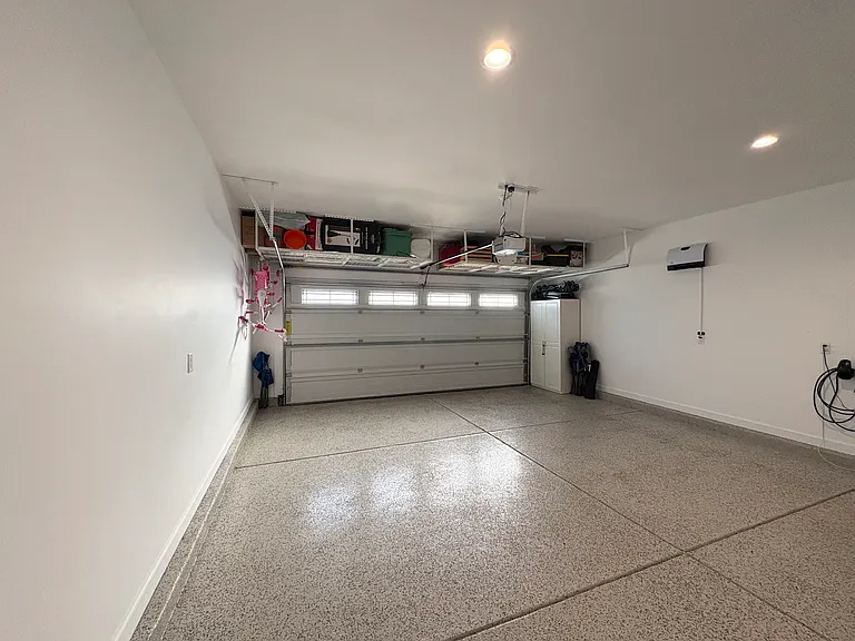 Epoxy coated garage, Over-head storage, Tesla Charger