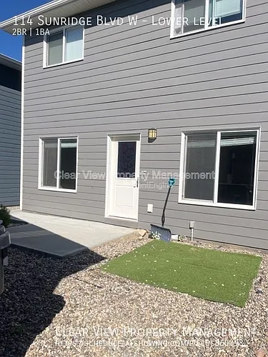 114 Sunridge Blvd W Photo 1
