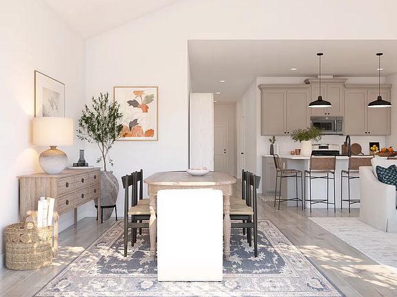 Dining Area with vaulted ceiling