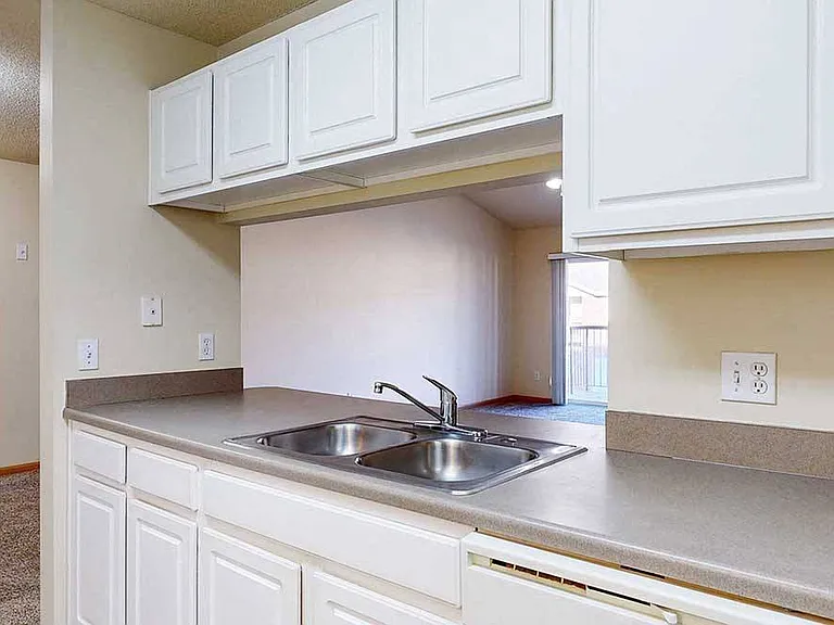Our kitchens offer a functional design with ample cabinetry and counter space, making meal prep and organization effortless.