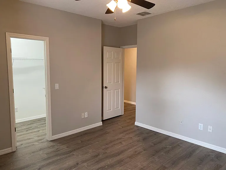 Primary bedroom with large, walk in closet