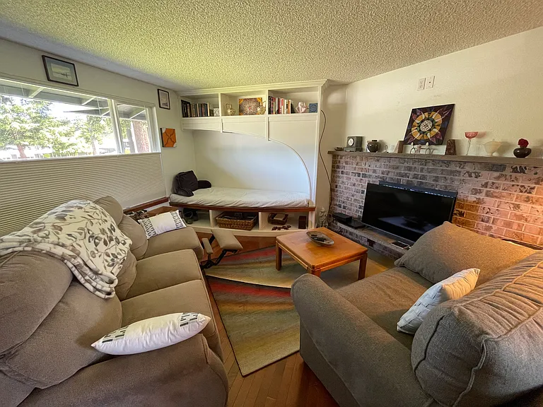 Living room furniture not included