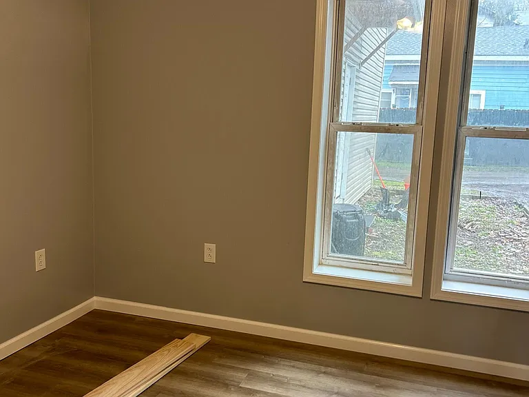 Still some construction materials on the floor in this middle main bedroom