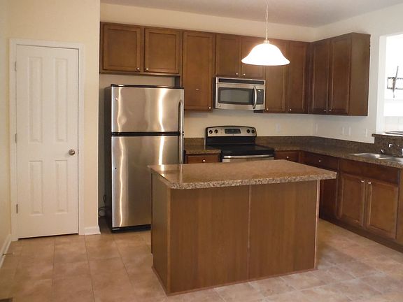 Kitchen with bar off island