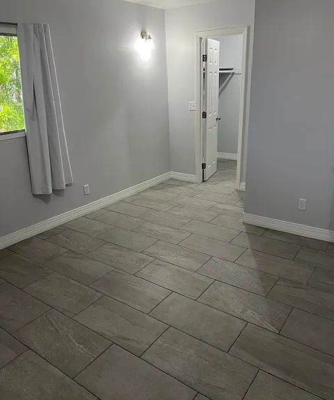Second Floor Master Bedroom, Brand New Tile and Grout Flooring, New Baseboard Molding, New Curtains, Wall Sconce Lighting, Ceiling Fan with Light, Walk in Closet, 3/4 Master Bathroom with Shower.