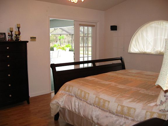 Master suite with french doors that open to pool! 