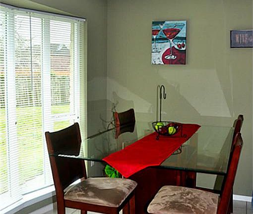 breakfast area over looks the beautiful backyard with NO back neighbors