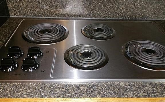 Frigidaire cooktop is same age all all the appliances. less than two years old and still looks new.