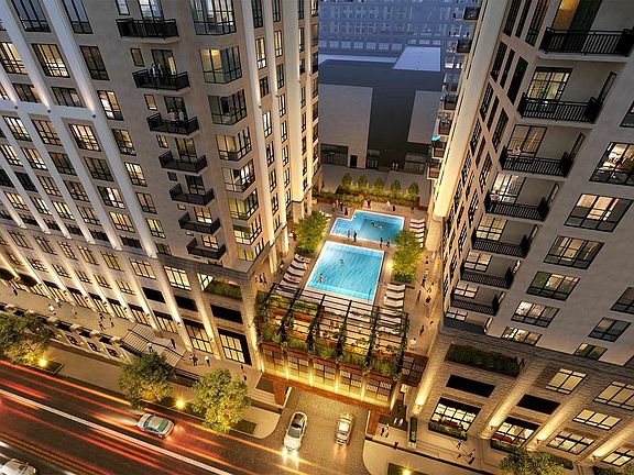 Relax above the city with a resort-style pool deck that offers private cabanas and serene skyline views.