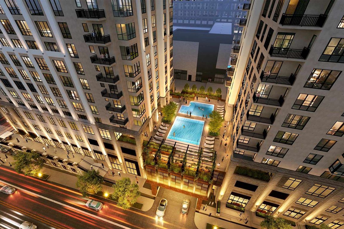 Relax above the city with a resort-style pool deck that offers private cabanas and serene skyline views.