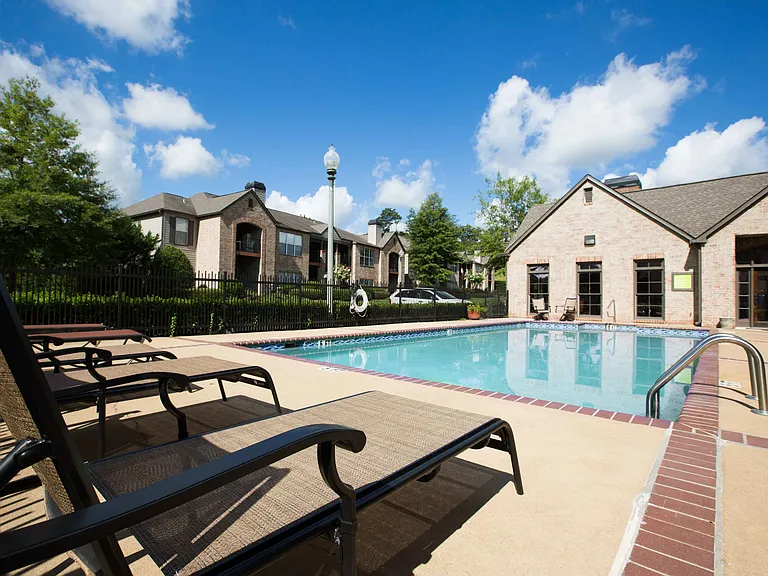 Sparkling Pool with Chaise Lounges