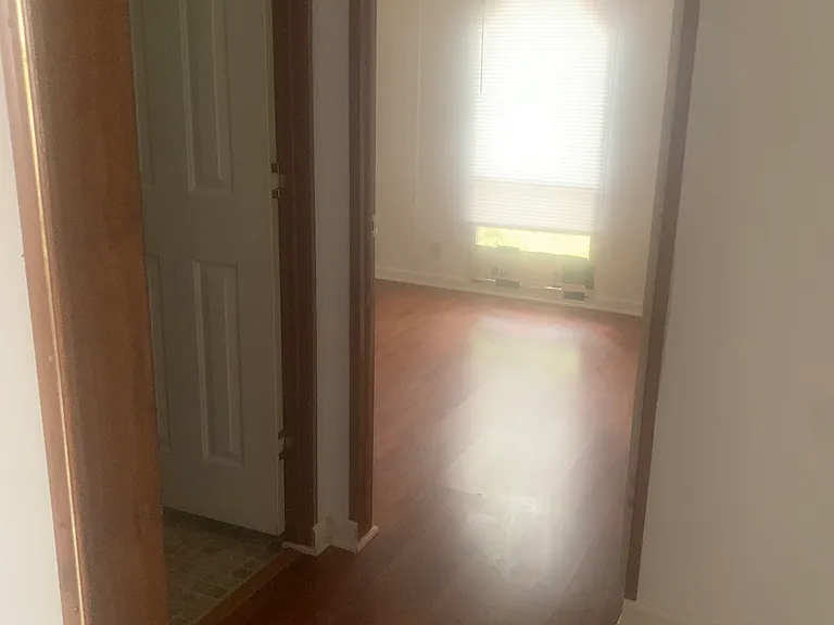 looking into 2nd bedroom. door to the left is hall bath