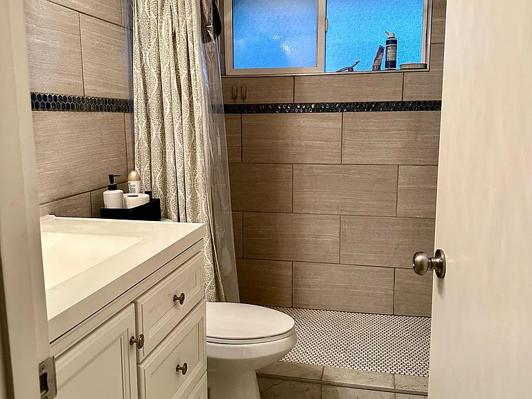 Step in full sized shower.