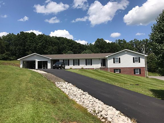 This photo shows entire Triplex. Apt 1 is on the left (with garage), Apt 2 is on the right (has rear balcony), and Apt 3 is bottom right.