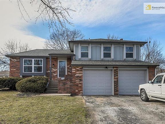 New driveway to be poured, weather permitting.  New garage doors and keypad entry