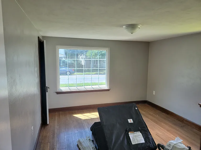 Bedroom with hardwood floors
