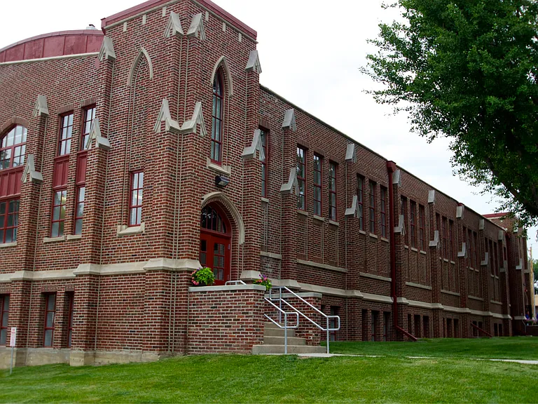 Exterior of 3 Points Loft with a red door.