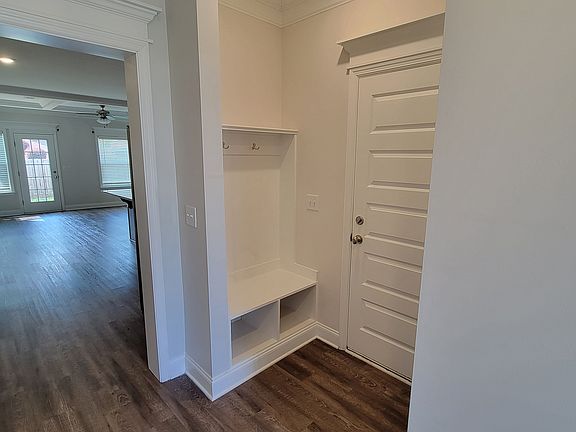Mud-room nook in front of entrance to garage