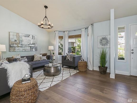 Vaulted ceilings and wide plank French oak floors welcome you home.