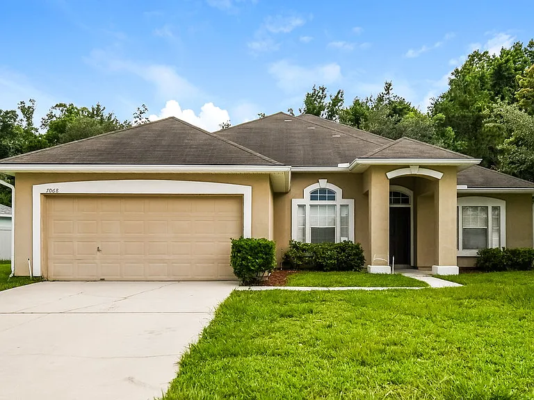 7068 Rapid River Dr W — Photo 1