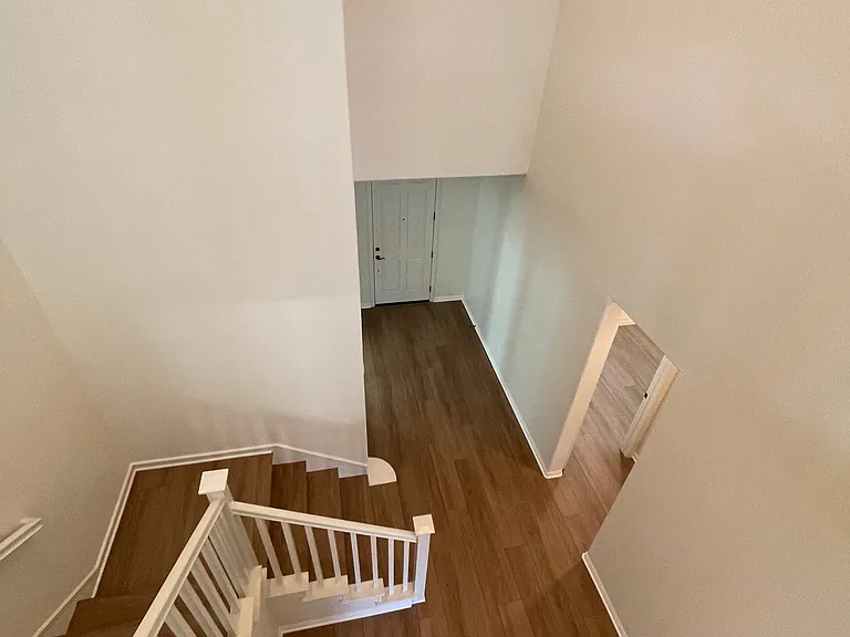 Stairs going down to 1st floor.