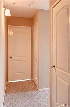 Hallway - 2 Linen Closets and Attic Space for Storage